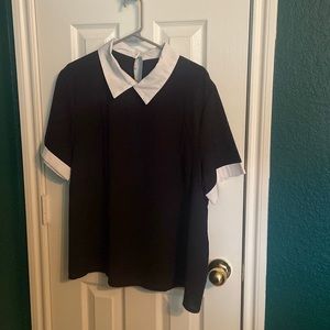 White collared black shirt